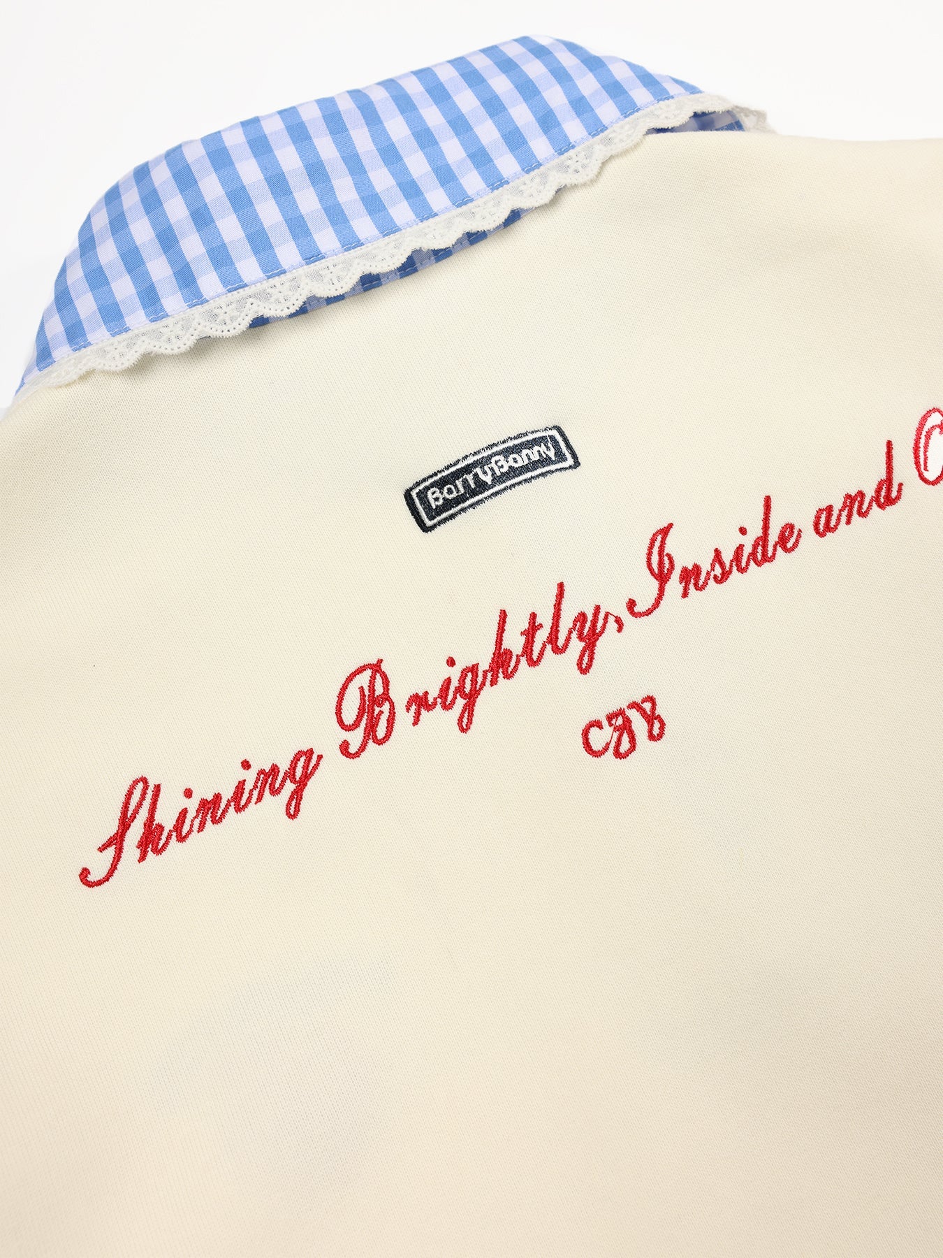 Layered Look Pullover Sweatshirt with Check Shirt Hem